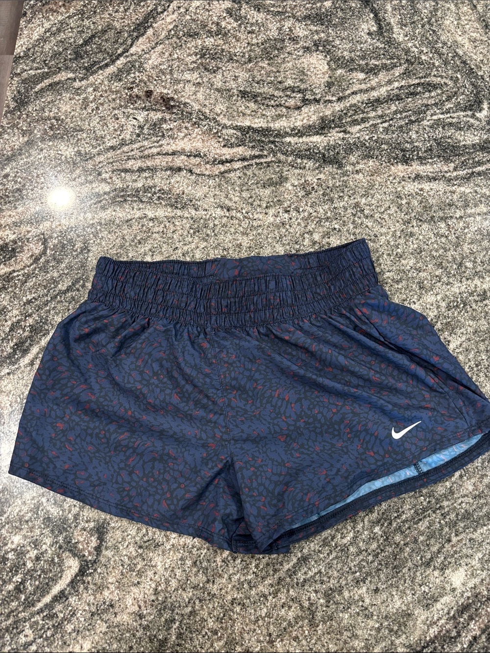 Nike Women's Navy Athletic Shorts with Red Print